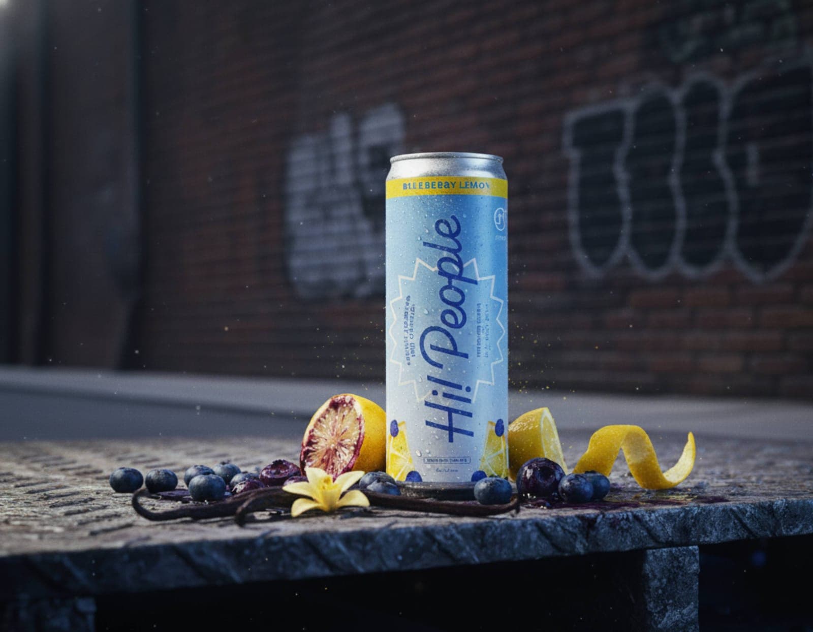 Hi! People Blueberry Lemon can on concrete with blueberries, lemon peel, vanilla flower, and vanilla bean against a brick wall
